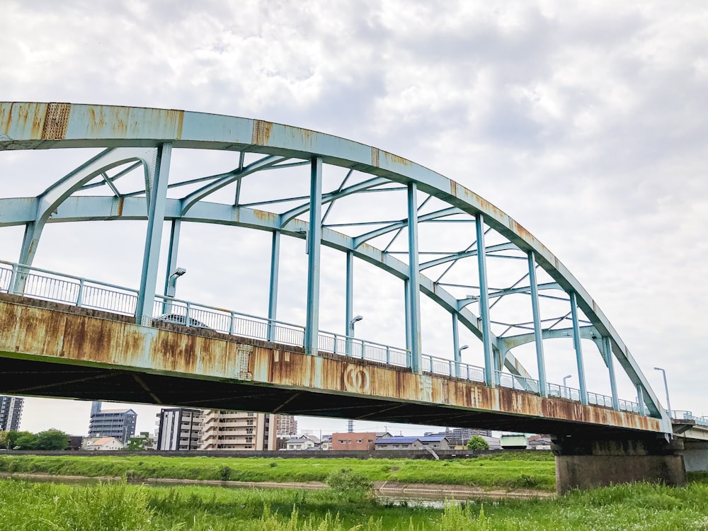 gray concrete bridge under gray sky during daytime