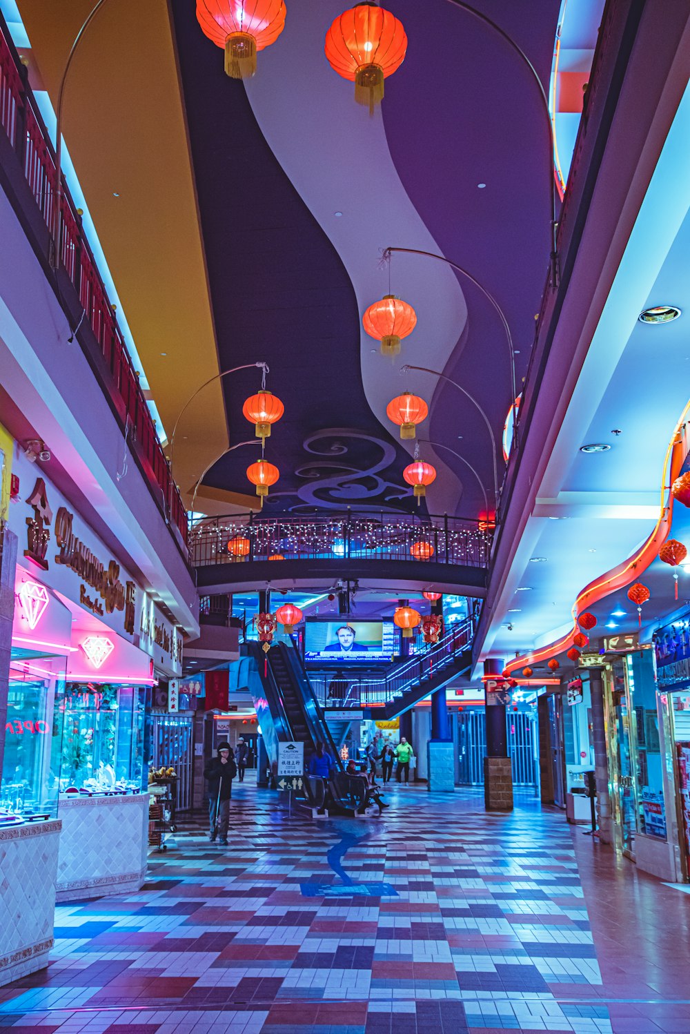 people walking on street during night time