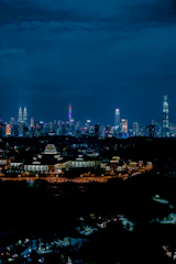city skyline during night time