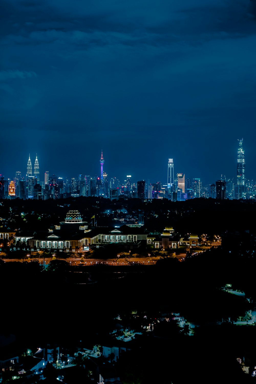 city skyline during night time