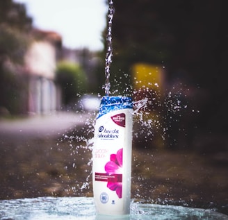 A happy customer using our shampoo, showcasing its effectiveness.