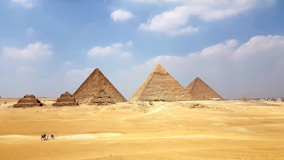 brown pyramid under blue sky during daytime