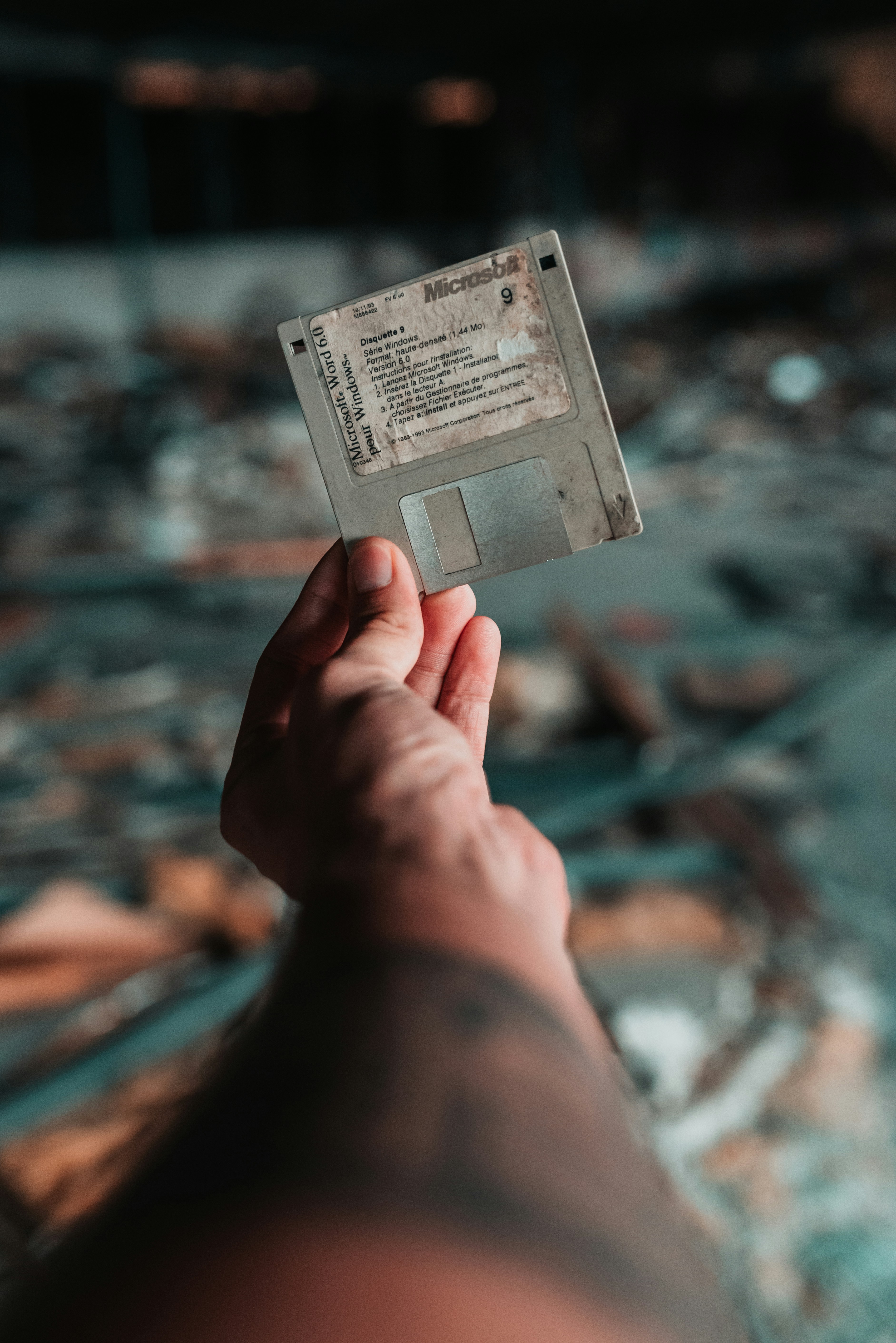 person holding white and black card