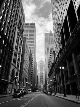 grayscale photo of city buildings
