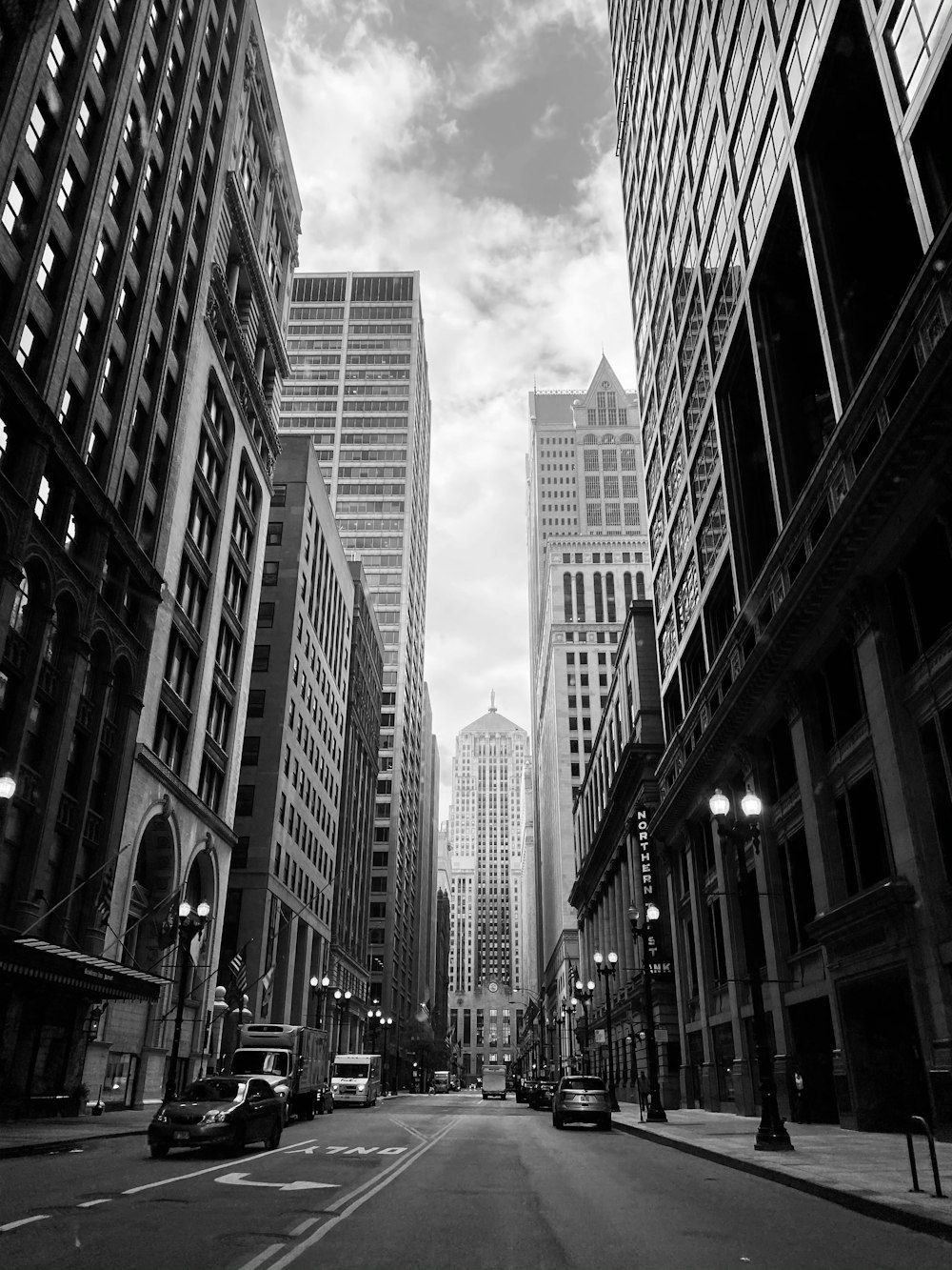 grayscale photo of city buildings