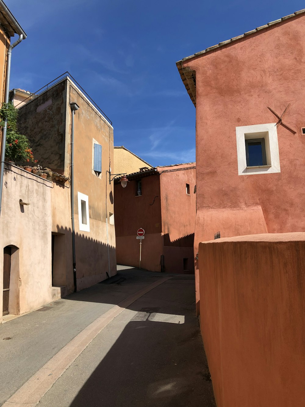 brown concrete building under blue sky during daytime