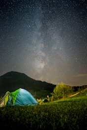 green tent under starry night