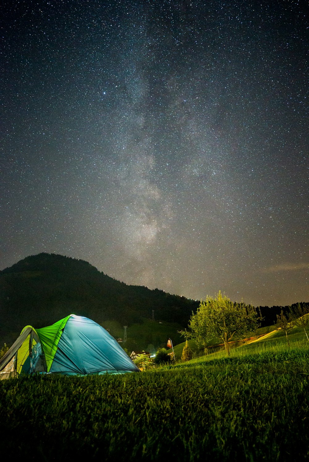 green tent under starry night