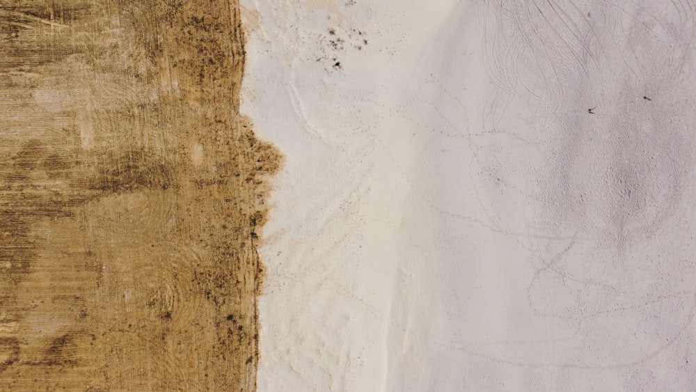 white sand and brown soil