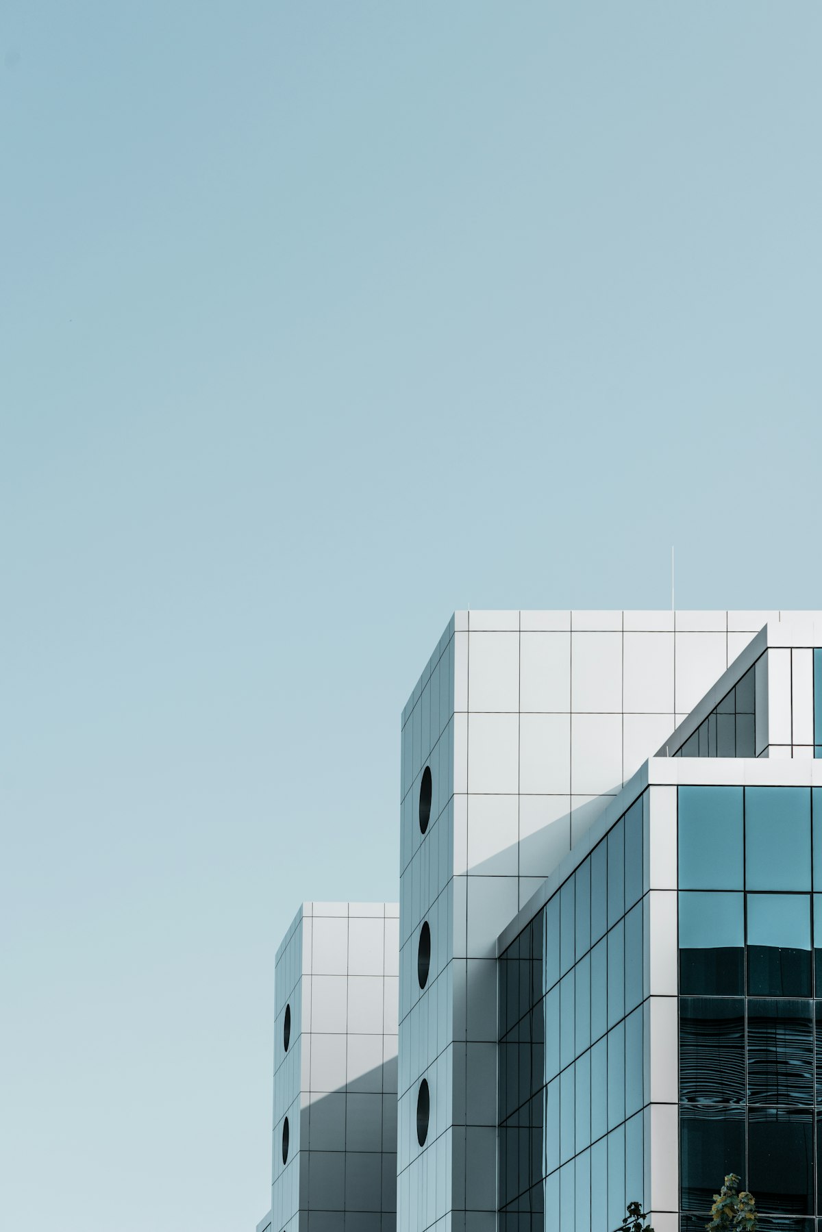 Modern gray concrete building exterior representing the Aventura dental office
