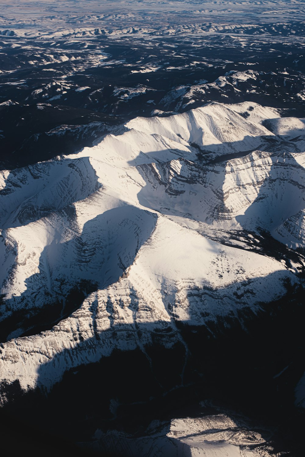 snow covered mountain during daytime