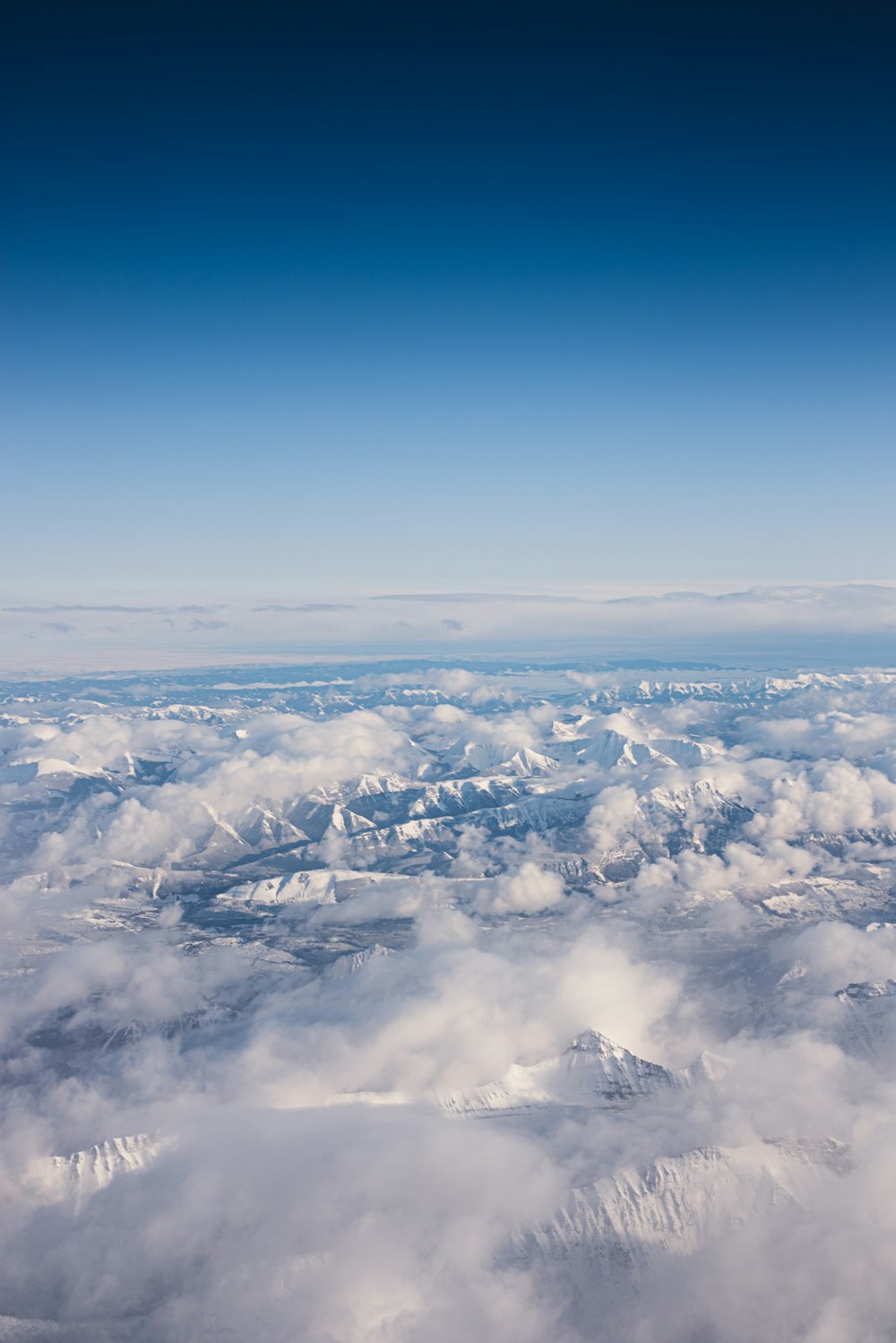 aerial view of white clouds and blue sky during daytime