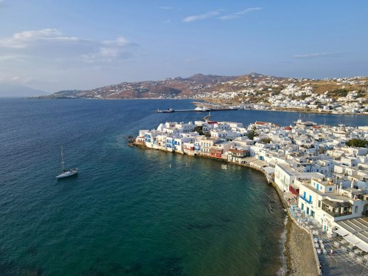 White and blue boat on sea during daytime — Mykonos, Greece