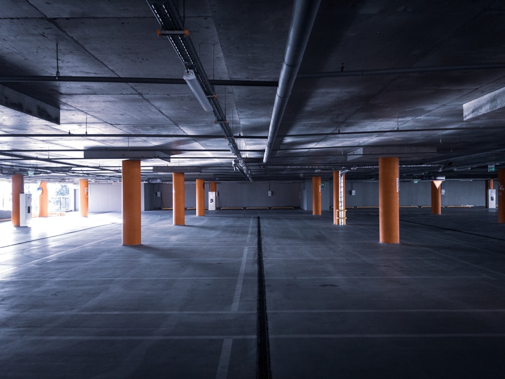 gray concrete floor with brown wooden post