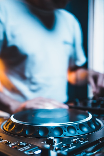 person in white shirt Djing