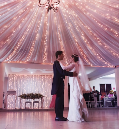 man and woman kissing on the floor