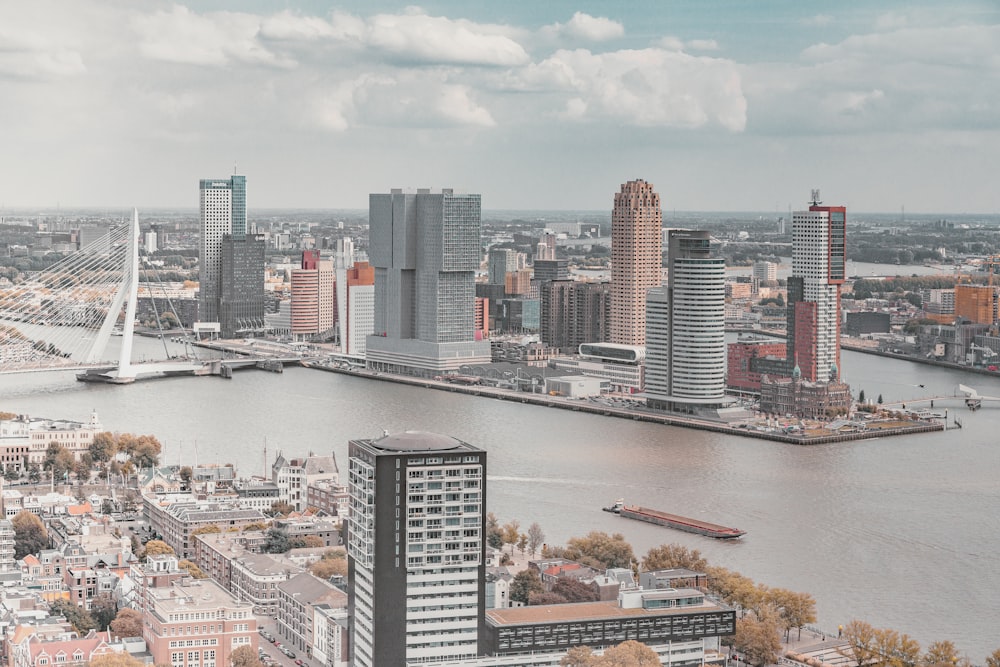 city skyline under white cloudy sky during daytime