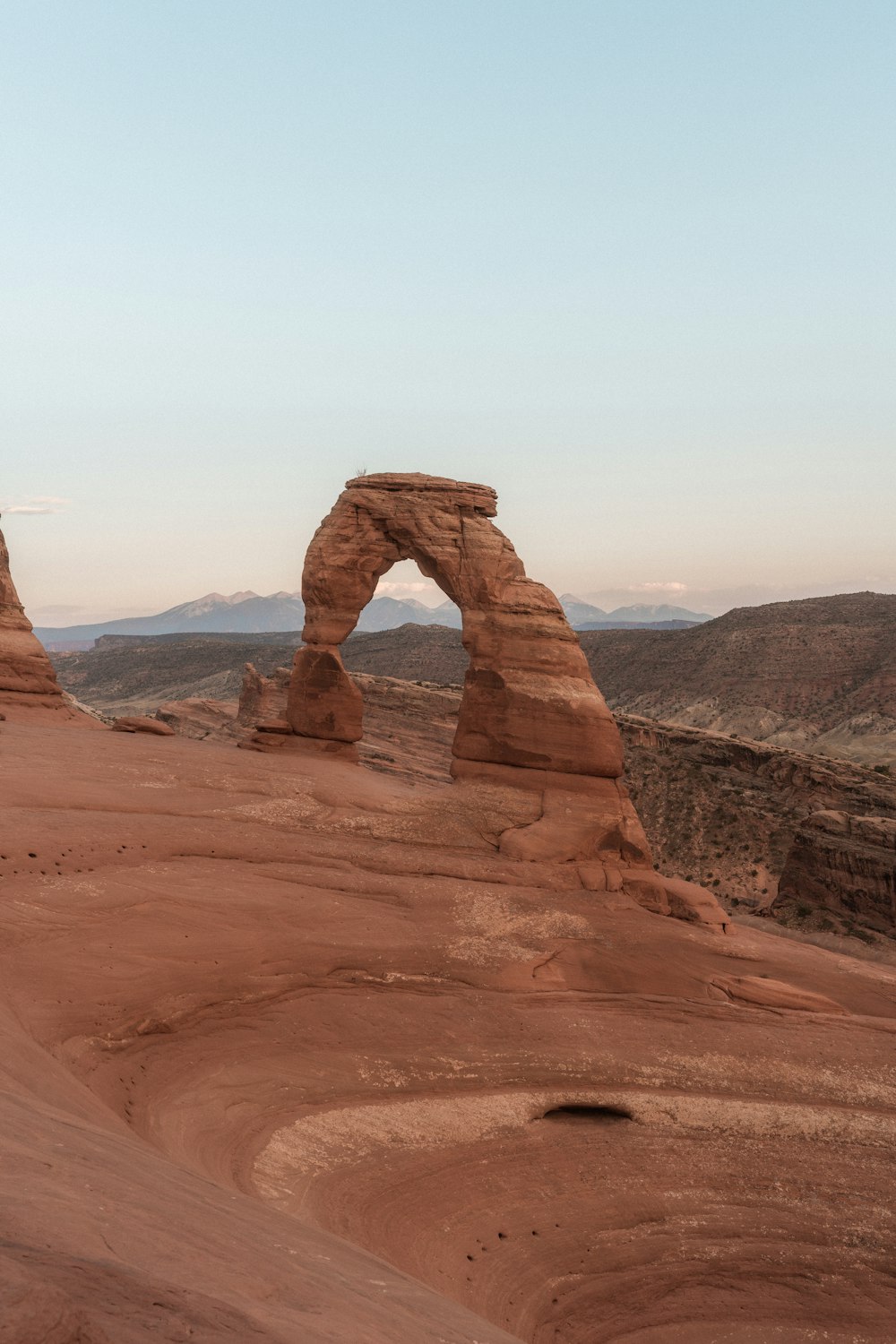 brown rock formation under blue sky during daytime