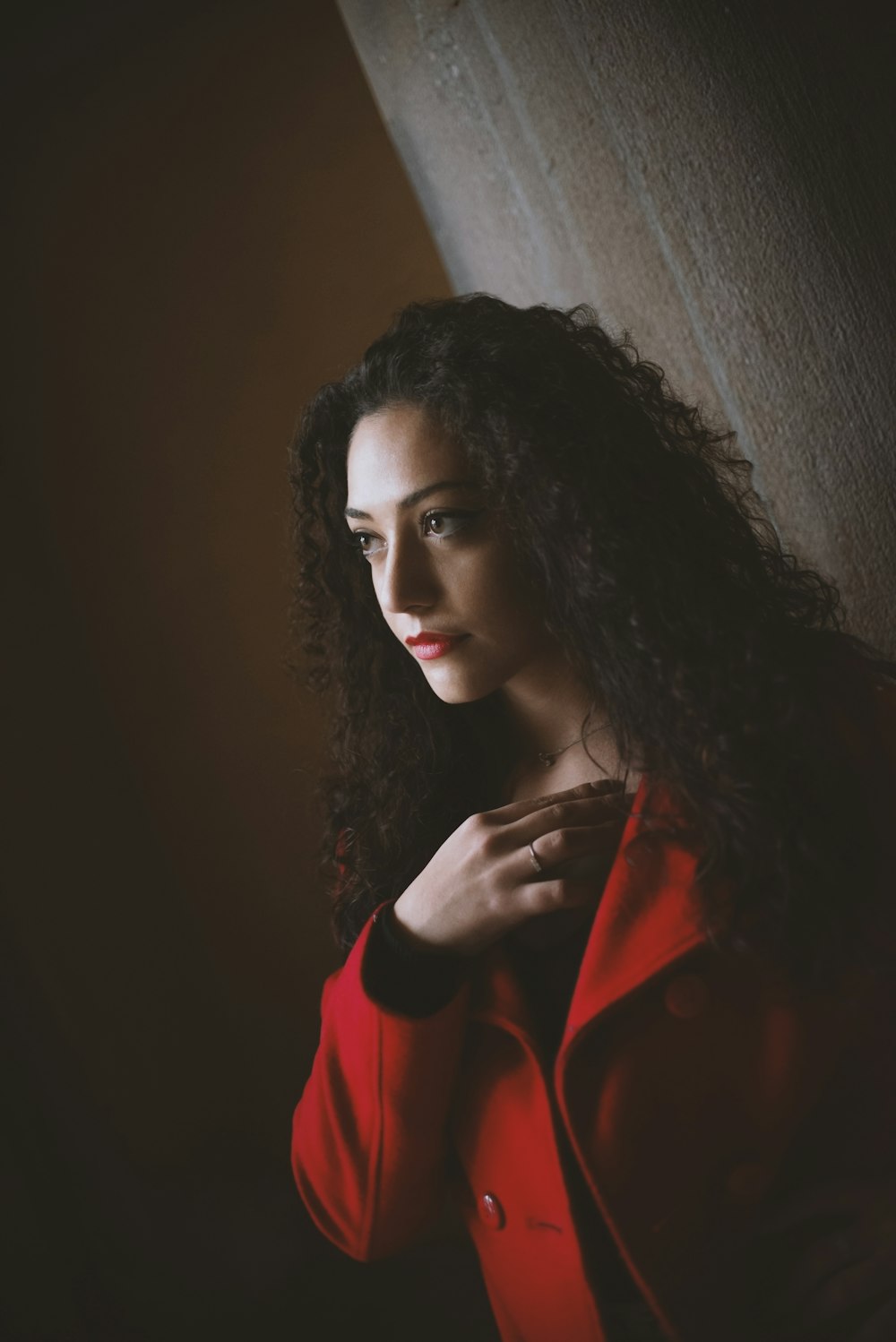 woman in red long sleeve shirt