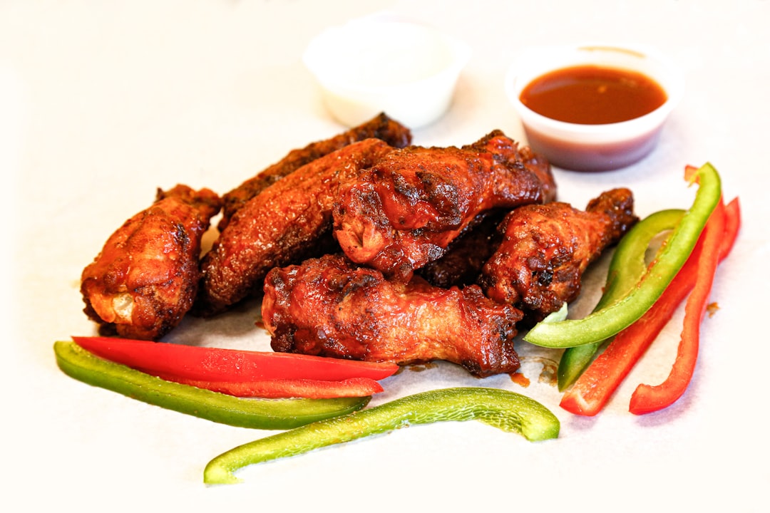 grilled meat with green vegetable on white ceramic plate, Chicken Wings