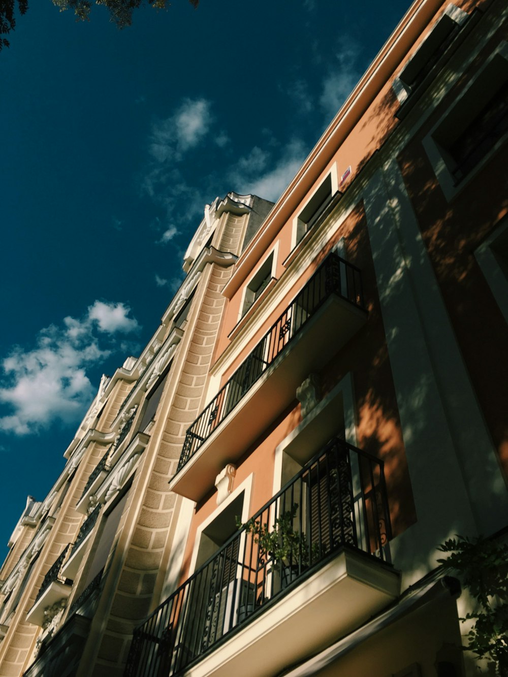 beige concrete building under blue sky during daytime