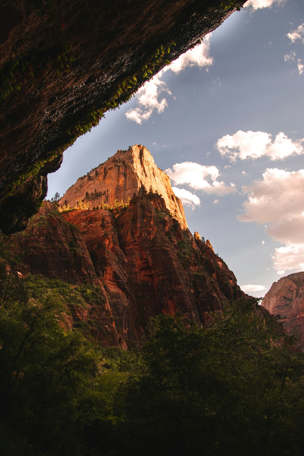 brown rocky mountain under blue sky during daytime