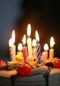 lighted candles on brown wooden table