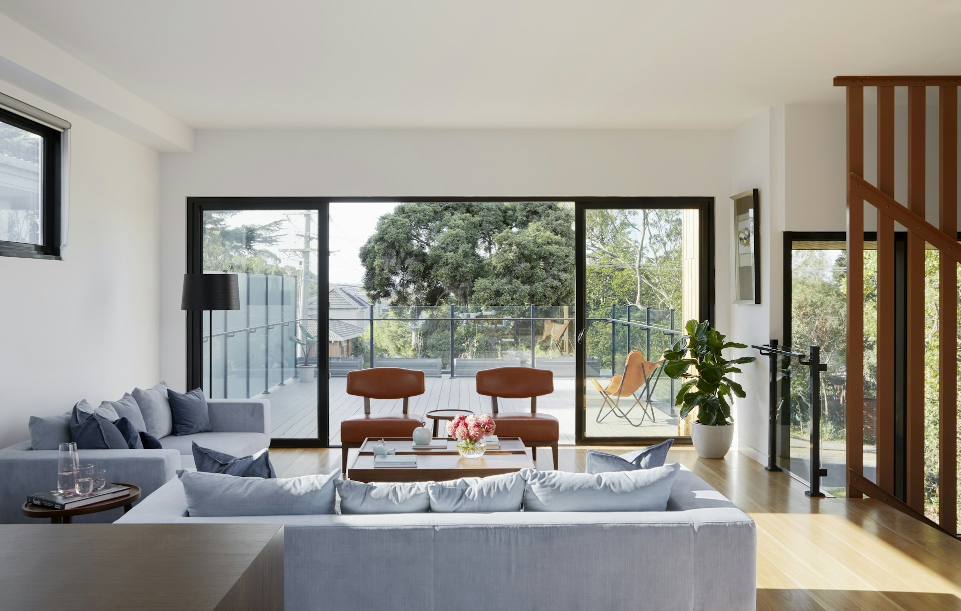 gray sectional couch near green potted plant