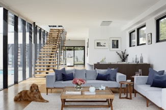 brown wooden coffee table near gray couch