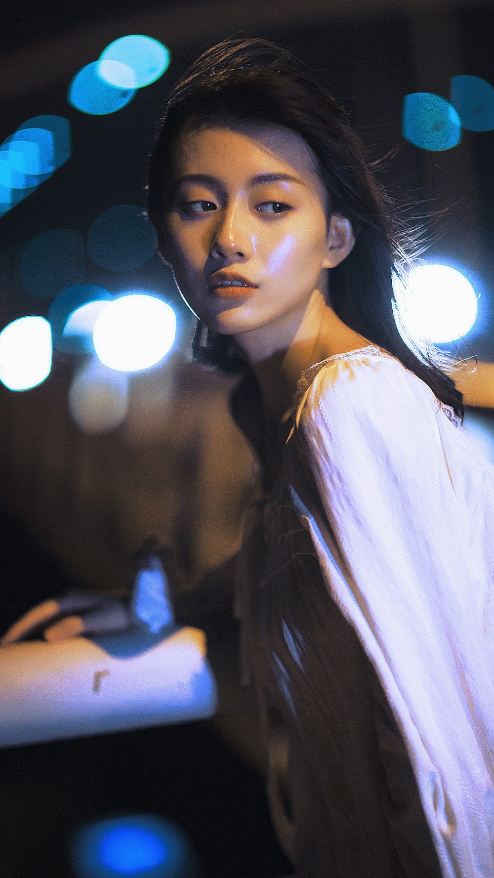 woman in white button up shirt