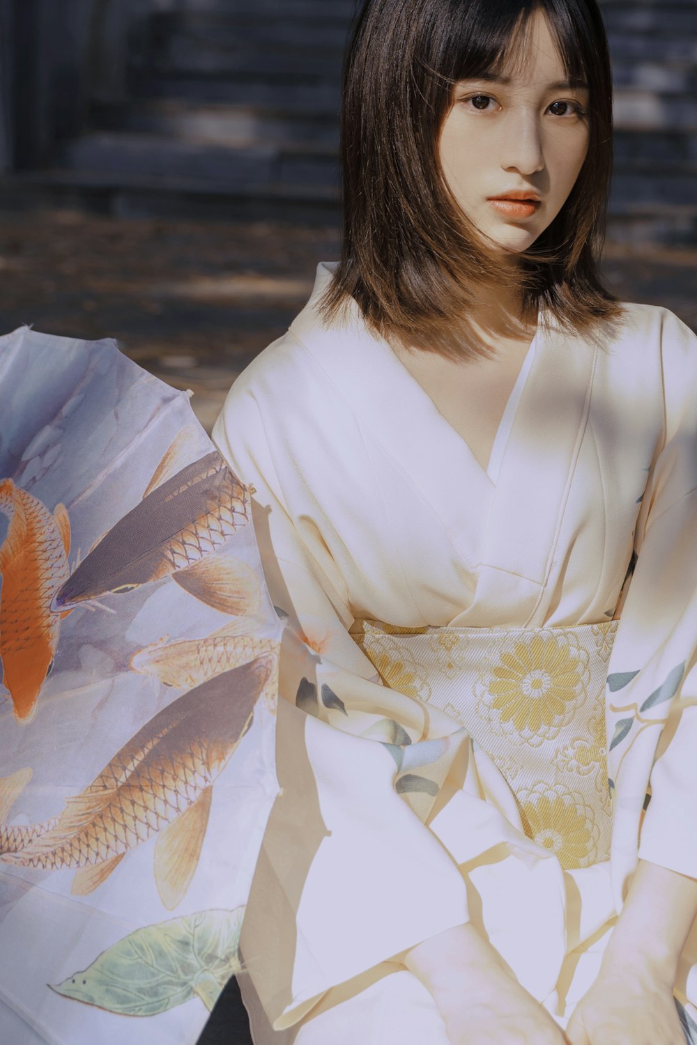 woman in white and yellow floral dress