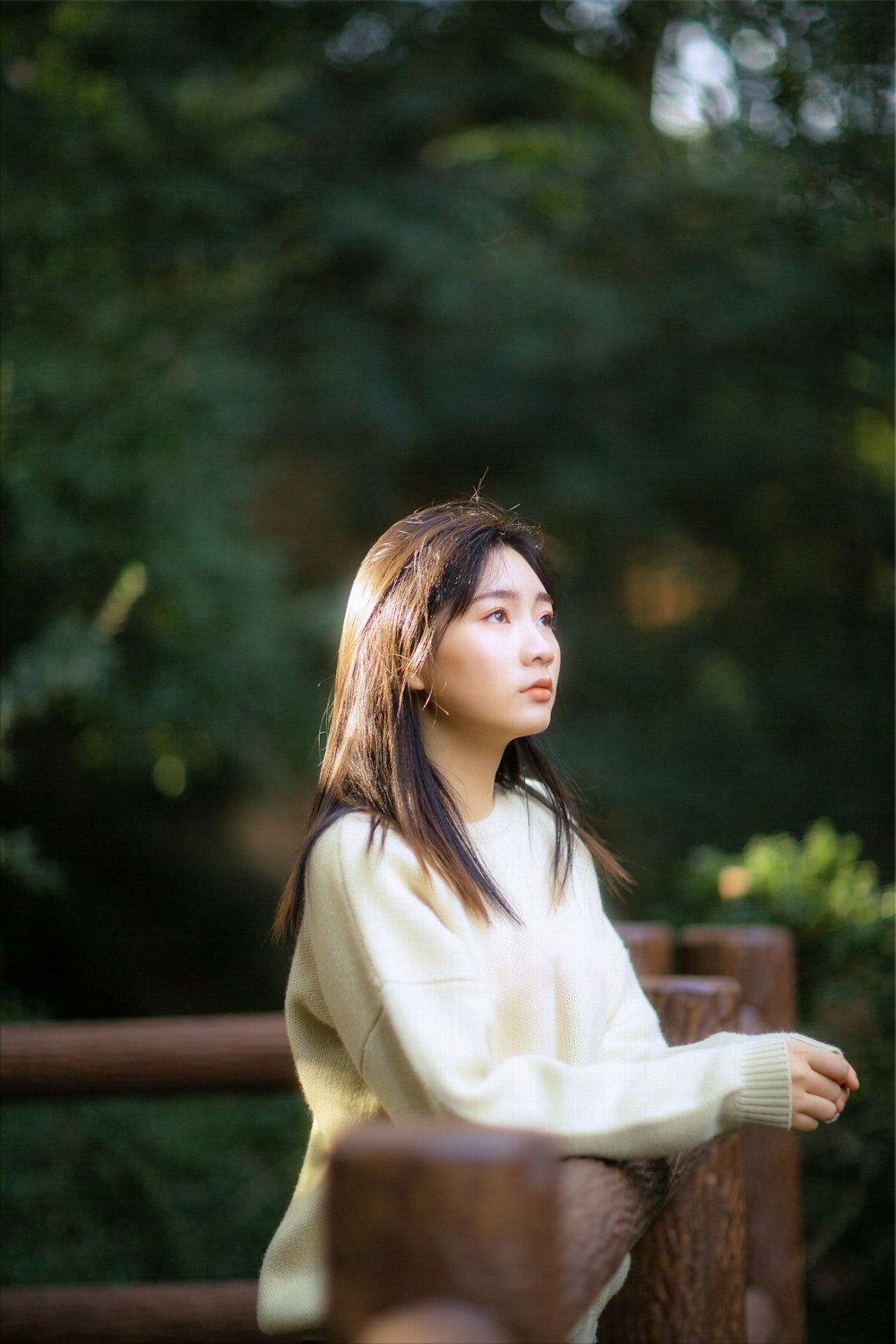 woman in white long sleeve shirt