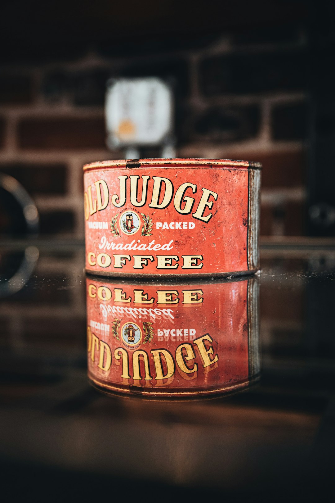 brown and red can on brown wooden table