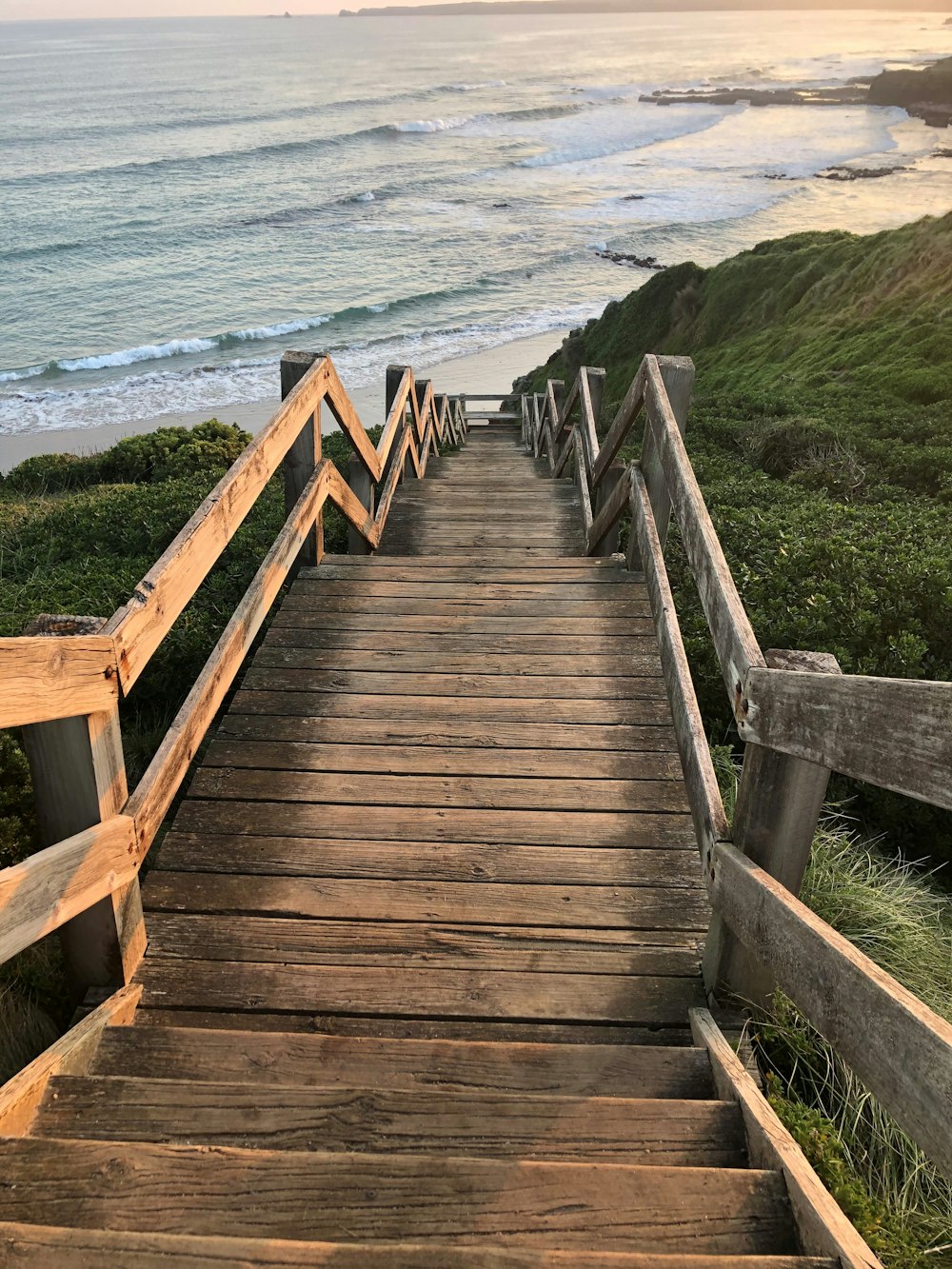 a set of stairs leading to the beach