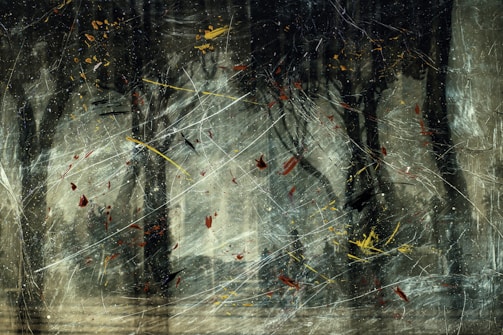 An abstract composition with dark, chaotic brushstrokes and splatters of color. The background suggests a forest with tall trees, obscured by a whirlwind of lines and random colorful elements.