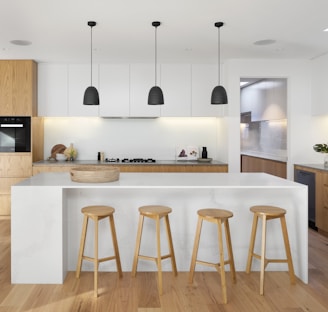 brown wooden seat beside white wooden table