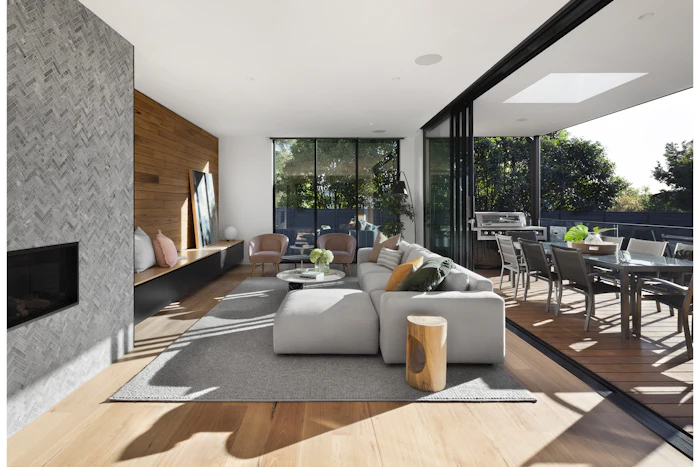 A living room opening onto a deck