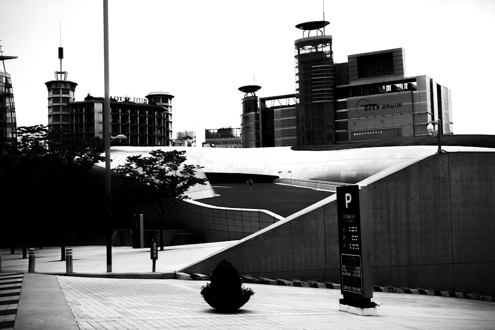 grayscale photo of city buildings