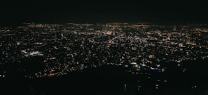 A panoramic view of a bustling Indian city skyline illuminated with digital data overlays symbolizing AI integration.