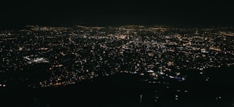 A panoramic view of a bustling Indian city skyline illuminated with digital data overlays symbolizing AI integration.
