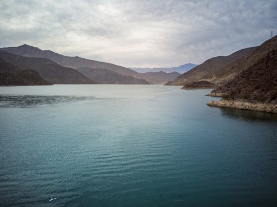 green lake near mountain during daytime in Embalse Puclaro Chile