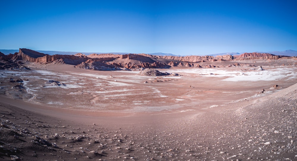 brown and white mountains under blue sky during daytime