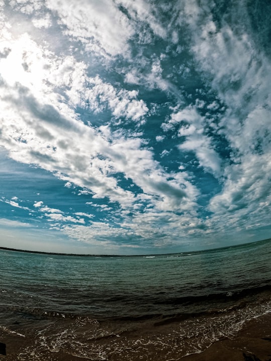 blue sky and white clouds over the sea in Barwon Heads VIC Australia