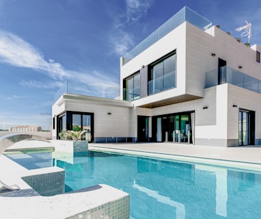 white concrete building under blue sky during daytime