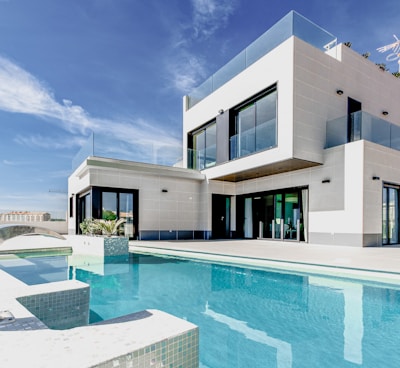 white concrete building under blue sky during daytime