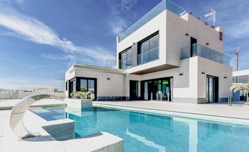 white concrete building under blue sky during daytime