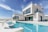 white concrete building under blue sky during daytime