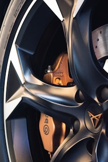gray and orange car wheel