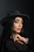 woman in black hat and black shirt