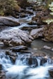 gray and black rocks on river